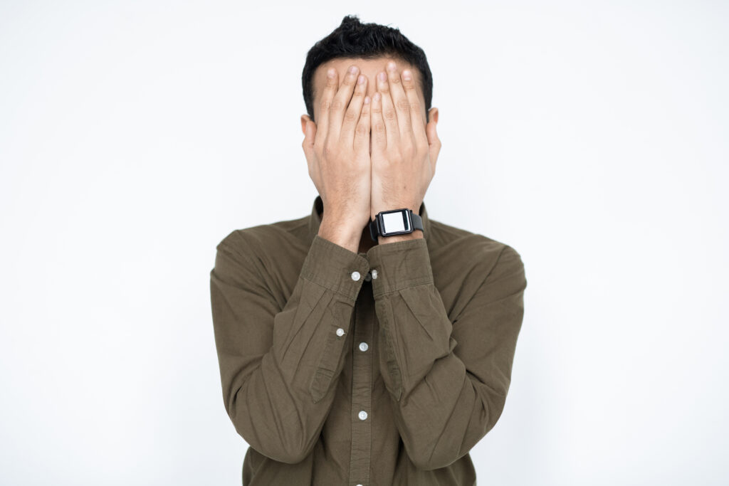 Young Businessman Covering His Face Original 439511